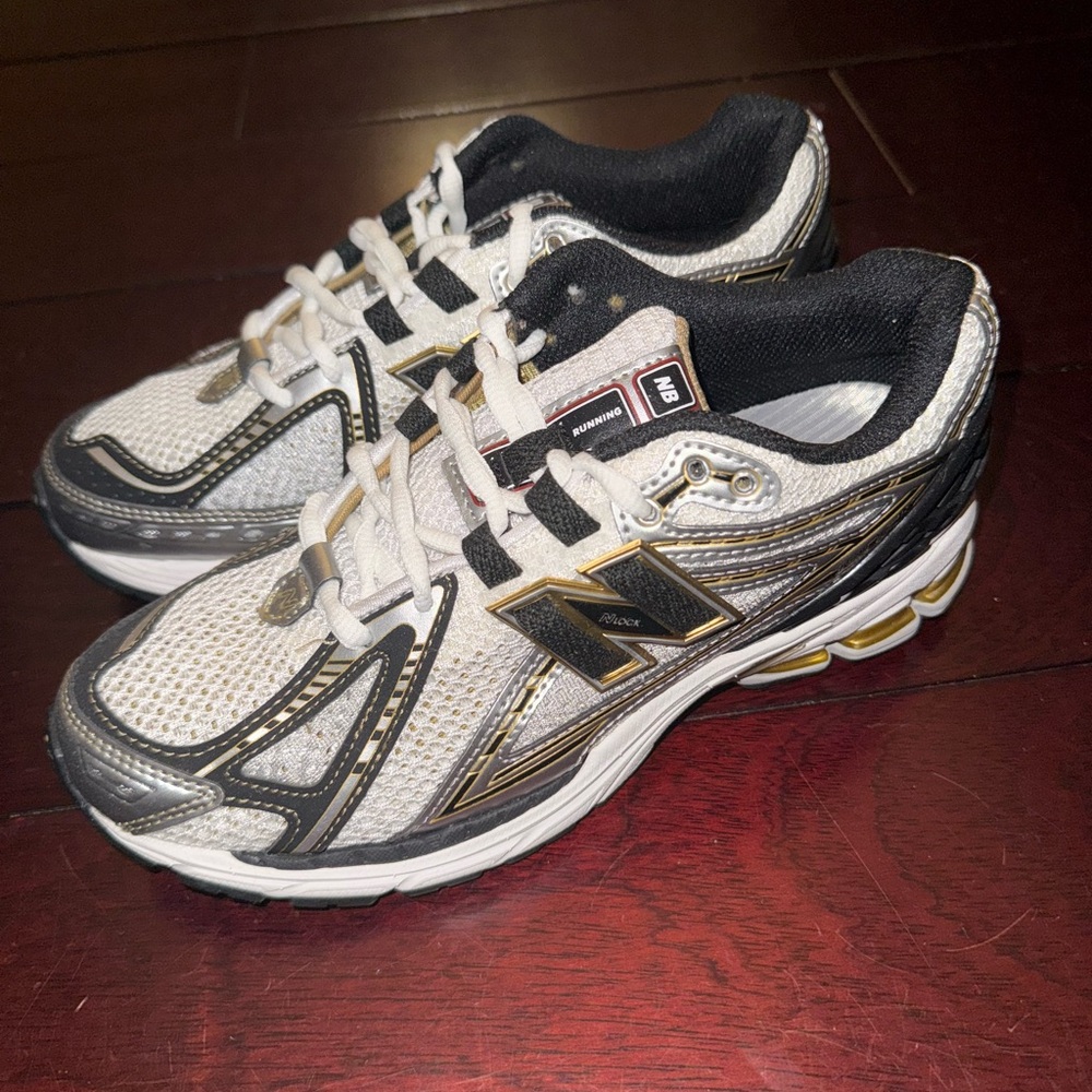On Trend - New Balance Black and Gold Athletic Sneakers